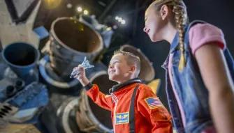 Kids exploring Space Shuttle Atlantis exhibit, Kennedy Space Center