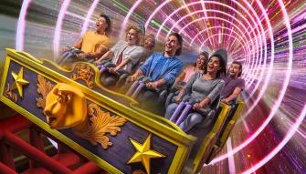 Madagascar Mad Pursuit roller coaster at MOTIONGATE™ Dubai with excited riders