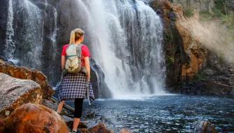 Grampians National Park Day Tour Lady stood at the edge of MacKenzies Falls