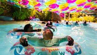 Boy at AquaGlow pool party at Aquatica Orlando