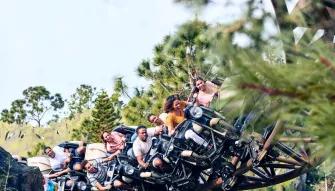 Guests riding Hagrid’s Magical Creatures Motorbike Adventure™ at Universal Islands of Adventure