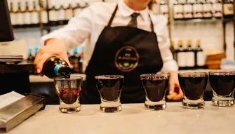 Pouring local drinks