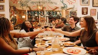 A group enjoying a Tapas meal