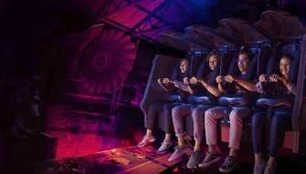 xcited riders enjoying the Batman: Knight Flight roller coaster at Warner Bros. World Abu Dhabi xcited riders enjoying the Batman: Knight Flight roller coaster at Warner Bros. World Abu Dhabi
