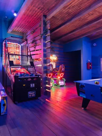 Large Games Room with dramatic lighting in a luxurious Orlando Villa