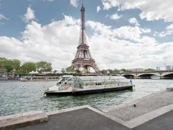 Batobus Sightseeing Cruise ship in front of the Eiffel Tower