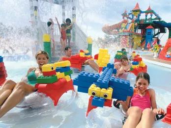 Family on Build-A-Raft River at LEGOLAND Water Park Dubai