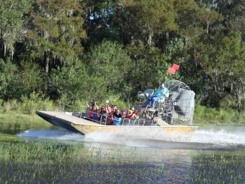 Guests enjoying an airboat ride at Boggy Creek Orlando