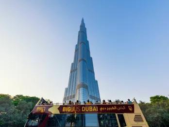 Guests on top of a Big Bus Sightseeing Bus taking photos of Burj Khalifa