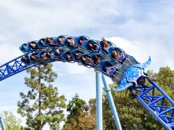 Guests riding Manta roller coaster at SeaWorld San Diego in California