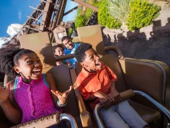 Expedition Everest Two guests smiling as they go down the drop on Expedition Everest