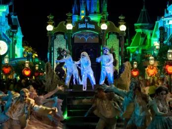 The hitchhiking ghosts on a parade float in Mickey's Boo To You Halloween Parade