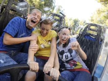 Family on Grizzly River Run at Disney California Adventure Park
