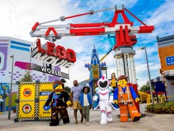 LEGOLAND California guests and LEGO cast members in front of LEGO Movie World