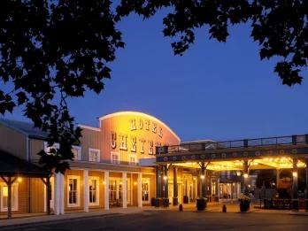 The front entrance of Disney Hotel Cheyenne designed to look like a wild-west stable