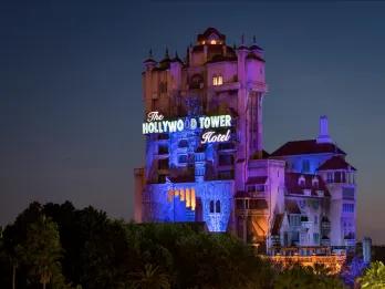 The Hollywood Tower Hotel lit up at night