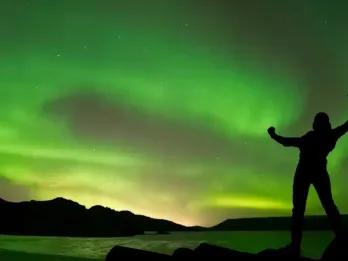 person-silhouette-against-lights