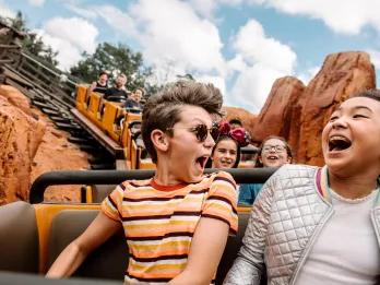 Big Thunder Mountain Railroad A boy and a girl riding Big Thunder Mountain at Magic Kingdom
