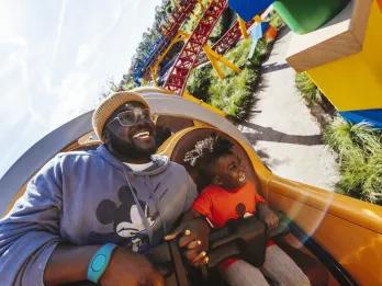 Slinky Dog Dash A father and son riding Slinky Dog Dash at Disney World