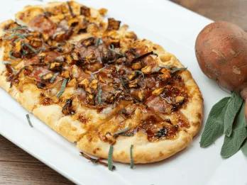 Autumn Pizza A long pizza topped with autumnal ingredients