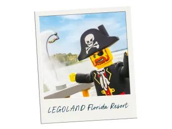 LEGOLAND Florida Resort A polaroid image of a LEGO pirate standing in front of a lake labelled LEGOLAND Florida Resort