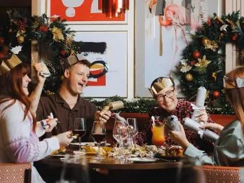 group-enjoying-festive-lunch