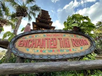 Walt Disney's Enchanted Tiki Room A sign outside a theme park ride called Walt Disney's Enchanted Tiki Room