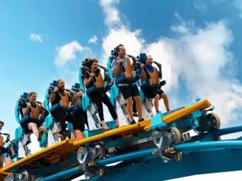 Pipeline The Surf Coaster People riding a stand-up surf coaster