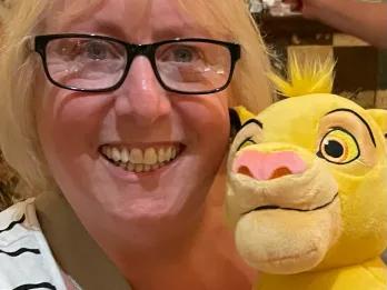 Wendy Female in a bar, holding a Disney Simba cuddly toy