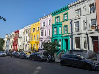 Row of multi-coloured london townhouses.