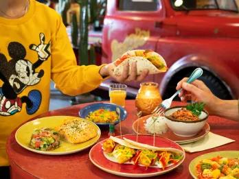 Half Board Meal Plan People at a restaurant table eating Mexican food