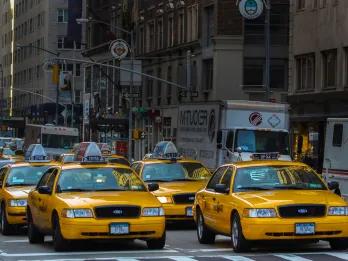 Taxi Yellow taxis along the street of New York City
