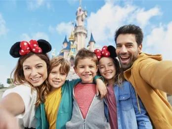 Family at DLP group selfie in front of castle Family at DLP group selfie in front of castle