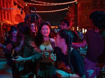 A group of friends being scared at a Halloween event