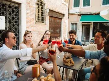 Friends toasting drinks