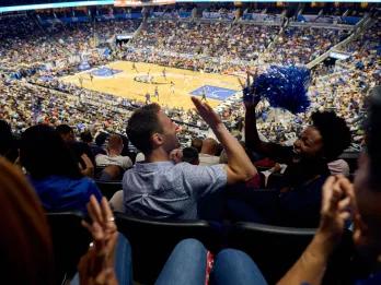 Spectators at an Orlando Magic Basketball game