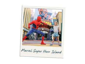 Marvel Super Hero Island Spiderman fist pumping a small girl in front of the Spiderman ride.
