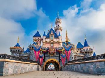 Sleeping Beauty Castle Sleeping Beauty Castle adorned with 70th anniversary flags and decorations