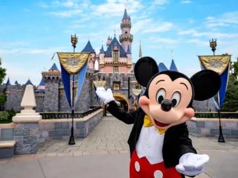 Mickey Mouse in front of the Castle at Disneyland California