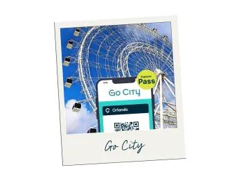White large ferris wheel with phone in front with pass on it and Go City logo.
