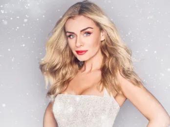 Woman dressed in sparkly white dress