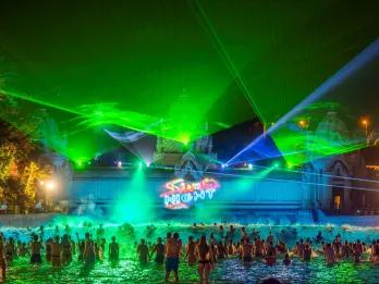 Strobe lights illuminating the beach at Siam Park during Siam Night