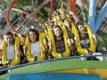 Four people on a roller coaster at PortAventura World