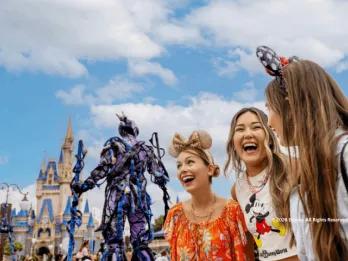Guests at Disneys Festival of Fantasy Parade
