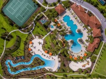Aerial view of the water park, lazy river, and tennis courts at Solterra Resort