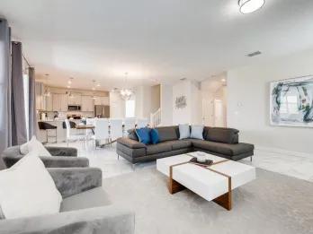 Open-plan living, dining and kitchen area in a family-friendly Orlando villa