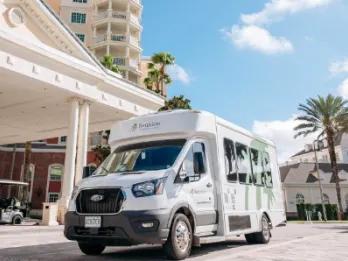 Reunion Resort shuttle van outside the clubhouse at an Orlando villa community