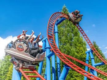 Riders on the Spinball Whizzer roller coaster at Alton Towers