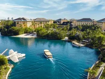 A water taxi boat outside Loews Royal Pacific Hotel