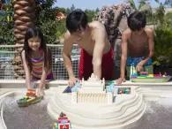 Family enjoying Build-A-Boat at LEGOLAND Water Park in Dubai